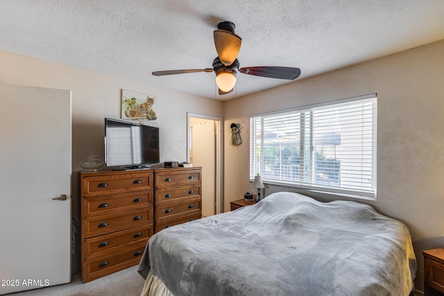 7210 W Caron Dr, Peoria, AZ 85345 - bedroom with light carpet, ceiling fan, and a textured ceiling