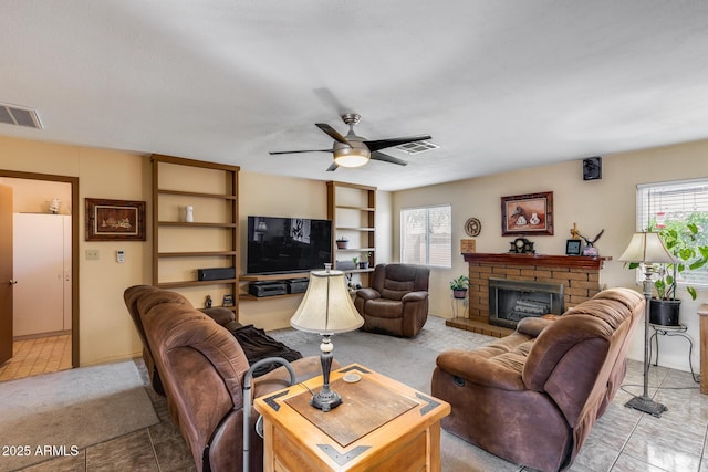7210 W Caron Dr, Peoria, AZ 85345 - living area with a brick fireplace and ceiling fan