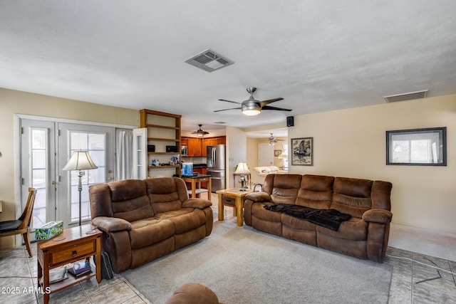 7210 W Caron Dr, Peoria, AZ 85345 - living area featuring a ceiling fan and light colored carpet