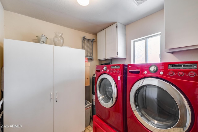 7210 W Caron Dr, Peoria, AZ 85345 - laundry area with cabinet space and washer and dryer