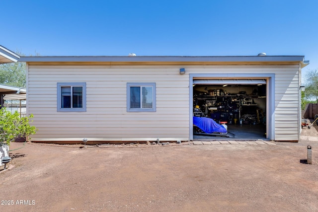 7210 W Caron Dr, Peoria, AZ 85345 - rear view of property with a garage