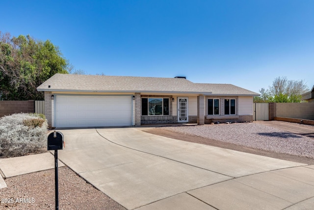 7210 W Caron Dr, Peoria, AZ 85345 - ranch-style home featuring concrete driveway, an attached garage, and brick siding