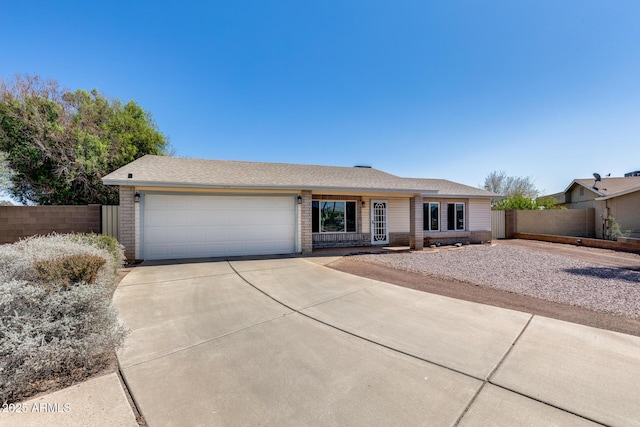 7210 W Caron Dr, Peoria, AZ 85345 - ranch-style house featuring driveway, an attached garage, and brick siding