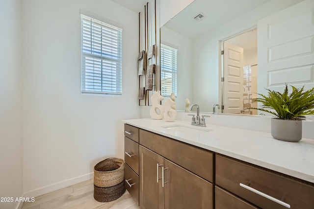 10105 E Ulysses Ave, Mesa, AZ 85212 - bathroom featuring vanity and baseboards