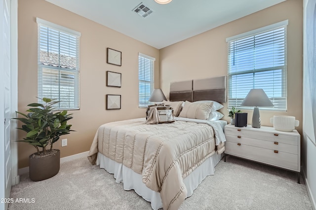 10105 E Ulysses Ave, Mesa, AZ 85212 - bedroom with light carpet, multiple windows, and baseboards