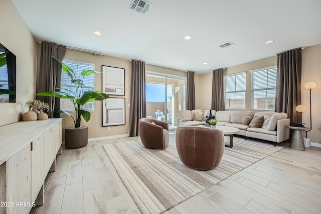 10105 E Ulysses Ave, Mesa, AZ 85212 - living room featuring baseboards, light wood-type flooring, and recessed lighting