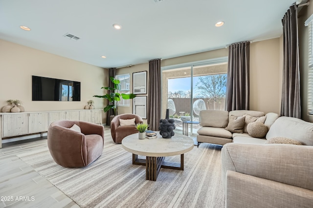 10105 E Ulysses Ave, Mesa, AZ 85212 - living room with recessed lighting and light wood-style floors