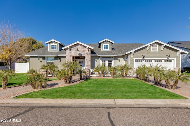 view of front facade featuring a garage and a front yard