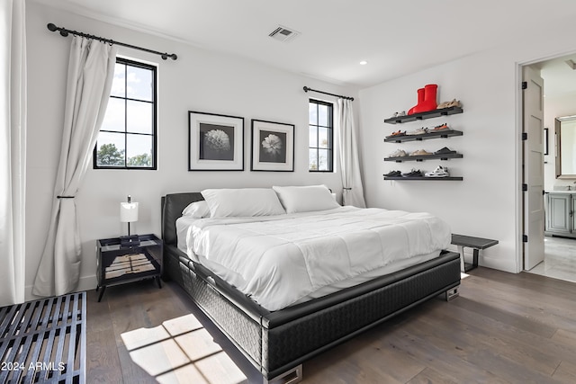 5929 E Indian School Rd, Phoenix, AZ 85018 - bedroom featuring wood finished floors, recessed lighting, and baseboards