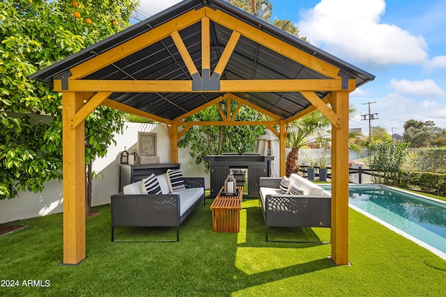 5929 E Indian School Rd, Phoenix, AZ 85018 - view of patio / terrace featuring a gazebo, an outdoor hangout area, and an outdoor kitchen