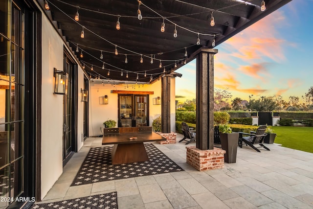 5929 E Indian School Rd, Phoenix, AZ 85018 - patio terrace at dusk with french doors and a patio