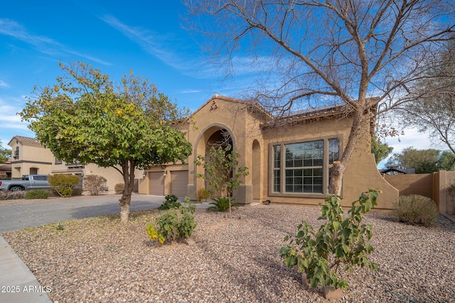 view of front of property with a garage