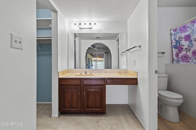 2264 S Don Carlos, Mesa, AZ 85202 - full bathroom with vanity, toilet, baseboards, and a shower with curtain