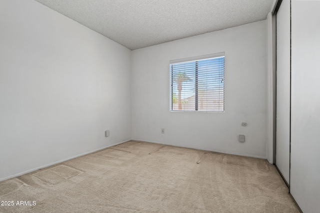 2264 S Don Carlos, Mesa, AZ 85202 - carpeted spare room with a textured ceiling