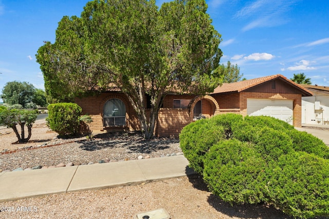 2264 S Don Carlos, Mesa, AZ 85202 - view of front facade featuring a garage, concrete driveway, and brick siding