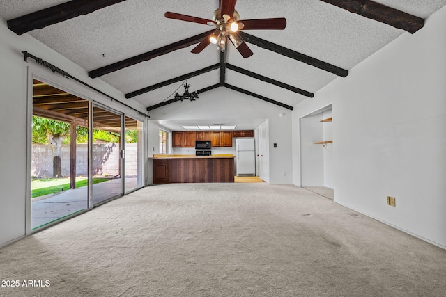 2264 S Don Carlos, Mesa, AZ 85202 - unfurnished living room featuring a textured ceiling, light carpet, a ceiling fan, and a chandelier