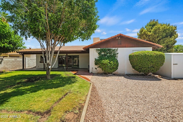 2264 S Don Carlos, Mesa, AZ 85202 - single story home with a tile roof, a patio, and stucco siding