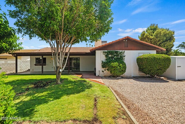 2264 S Don Carlos, Mesa, AZ 85202 - ranch-style home with a tile roof, stucco siding, and a patio area