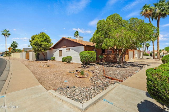 2264 S Don Carlos, Mesa, AZ 85202 - view of front of house with a chimney and stucco siding