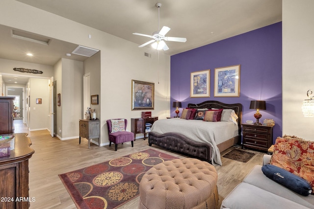 bedroom featuring light hardwood / wood-style floors and ceiling fan