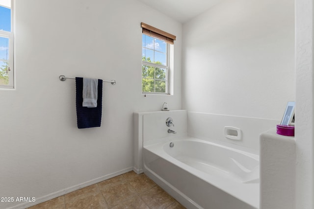 bathroom featuring a tub