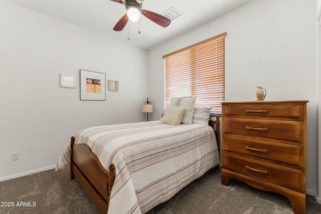 bedroom with dark carpet and ceiling fan