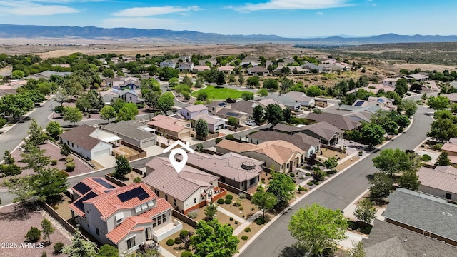 bird's eye view with a mountain view