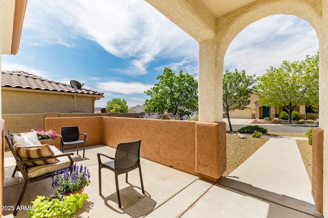 view of patio / terrace with a balcony