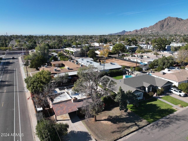 3404 N Kachina Ln, Scottsdale, AZ 85251 - aerial overview of property's location featuring a mountain backdrop and nearby suburban area