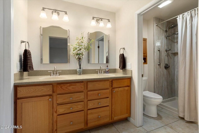 bathroom with a shower with curtain, tile patterned floors, toilet, and vanity