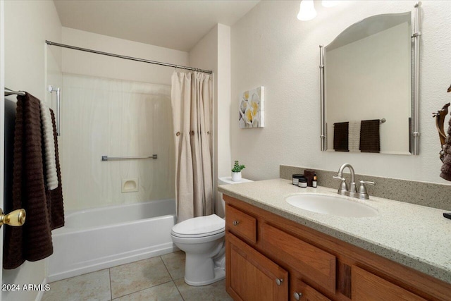 full bathroom with toilet, shower / bath combo, vanity, and tile patterned flooring