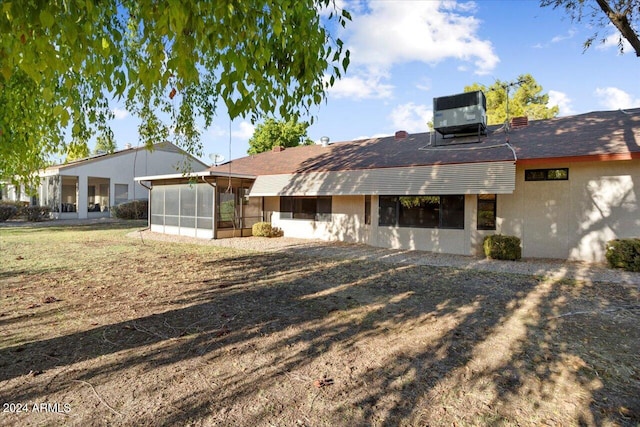 single story home with central AC and a sunroom