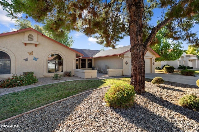 view of front of home with a garage