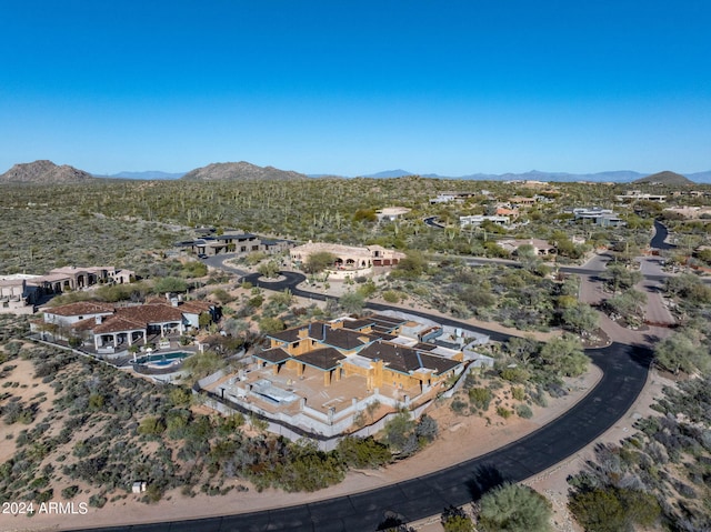 drone / aerial view featuring a mountain view