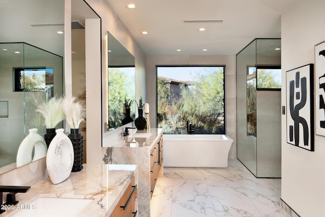 bathroom with vanity and plus walk in shower