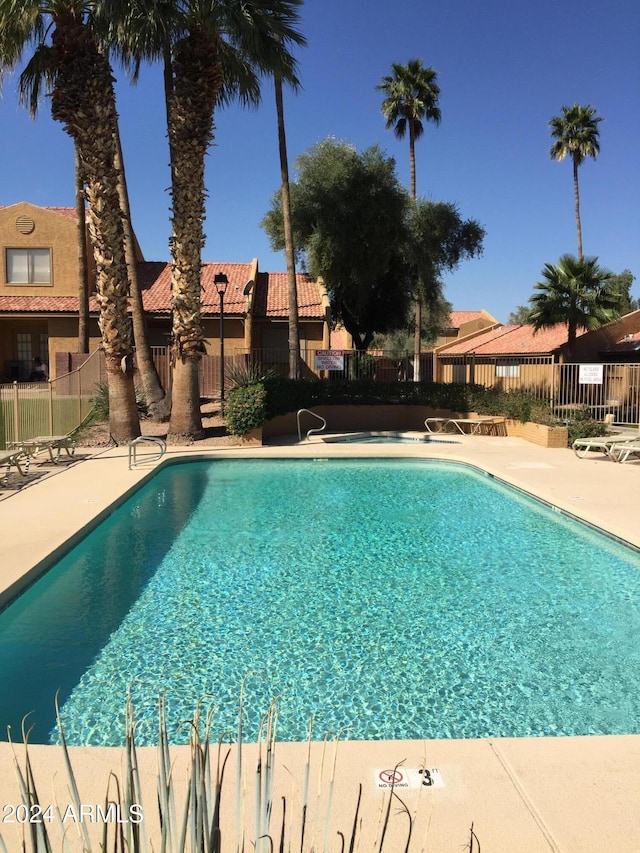 view of pool featuring a patio area