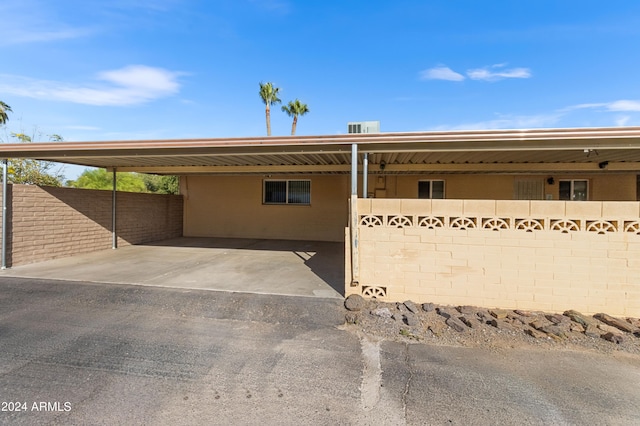 view of front of house with a carport