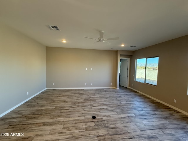 spare room featuring ceiling fan