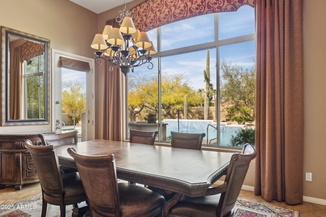 dining area featuring an inviting chandelier and light tile patterned floors