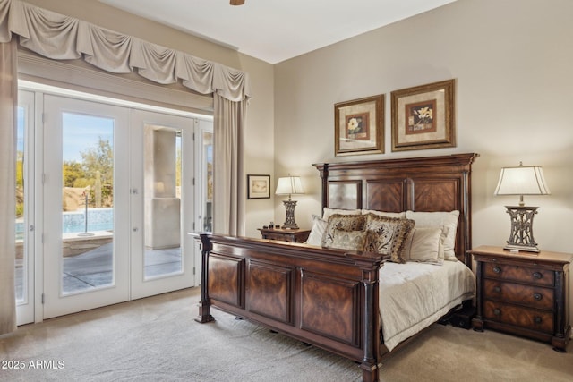 bedroom with access to exterior, light colored carpet, and french doors