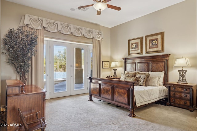 carpeted bedroom featuring french doors and access to exterior