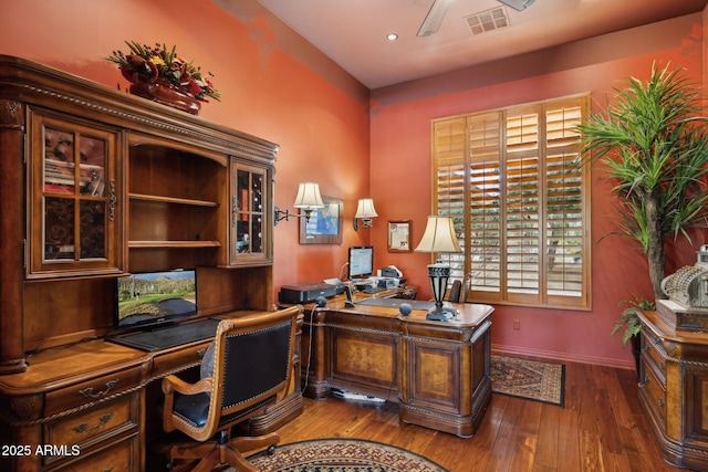 office space with dark hardwood / wood-style floors and ceiling fan