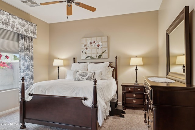 bedroom with light carpet and ceiling fan