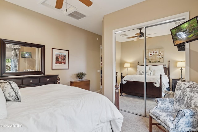 bedroom featuring a closet, ceiling fan, and carpet flooring