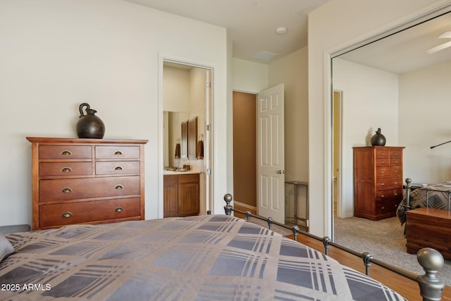 bedroom featuring connected bathroom