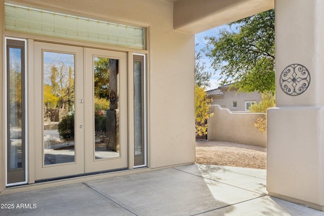 doorway to property with french doors and a patio area