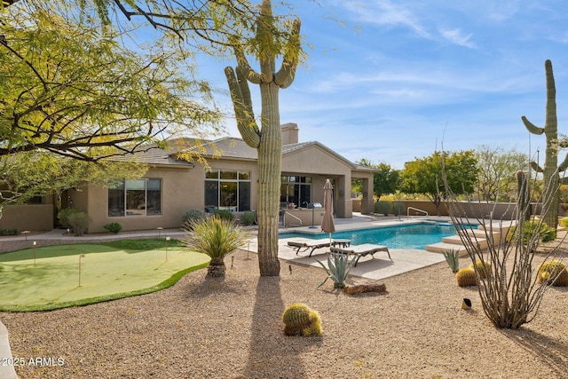 view of pool with a patio area