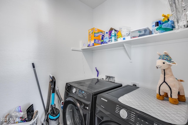 laundry room with laundry area and separate washer and dryer