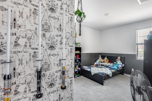 carpeted bedroom with baseboards and visible vents