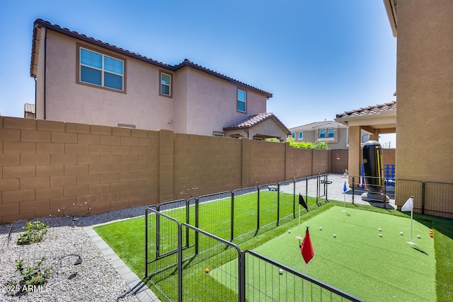 view of yard featuring a fenced backyard